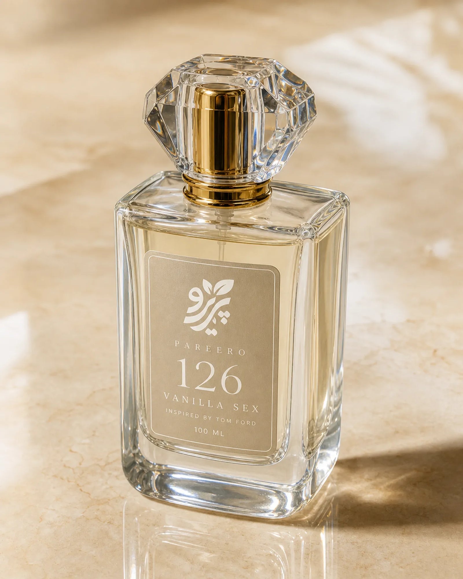 Pareero 126 inspired by Vanilla Sex three-quarter clear glass fragrance bottle image in warm golden light