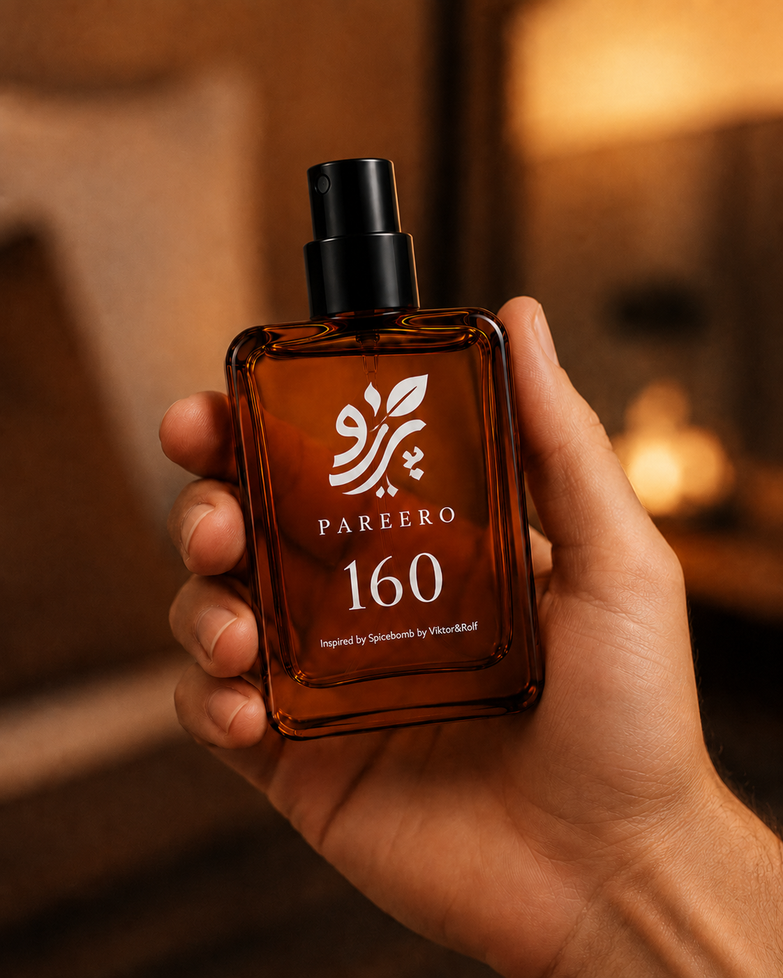 Pareero 160 inspired by Spicebomb fragrance bottle held in hand for product scale and lifestyle context