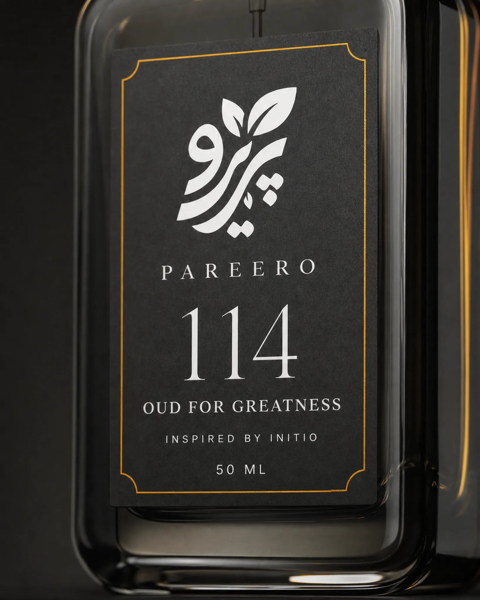 Pareero 114 inspired by Oud for Greatness macro label and bottle craftsmanship image