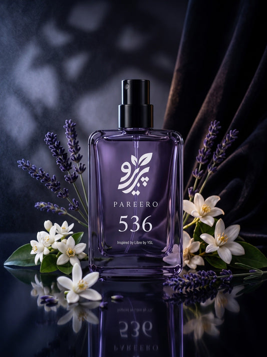 PAREERO 536 Libre-inspired fragrance with lavender and white florals on a reflective dark surface
