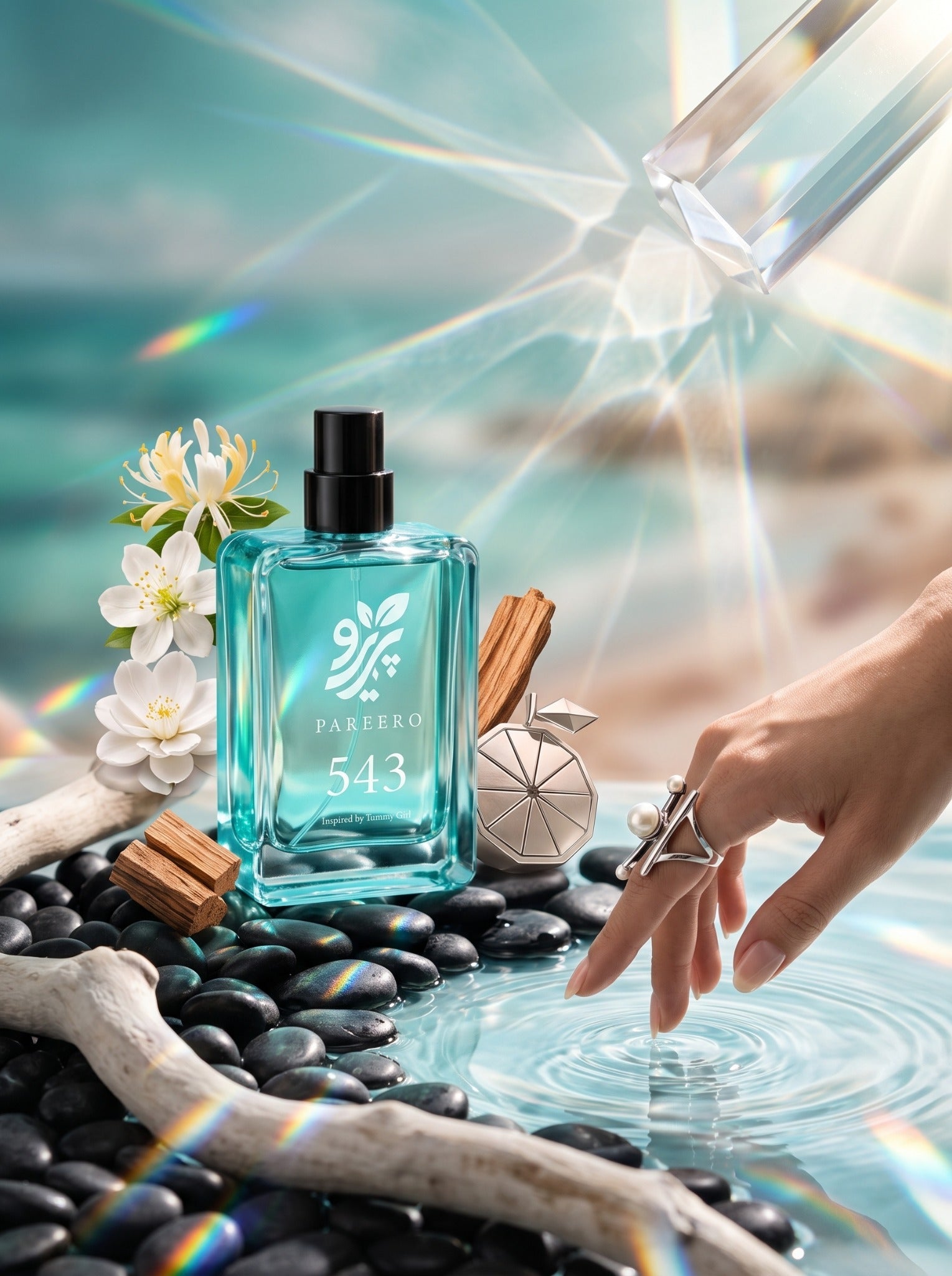 Editorial PAREERO 543 Tommy Girl-inspired fragrance campaign with white florals, black stones and water reflections