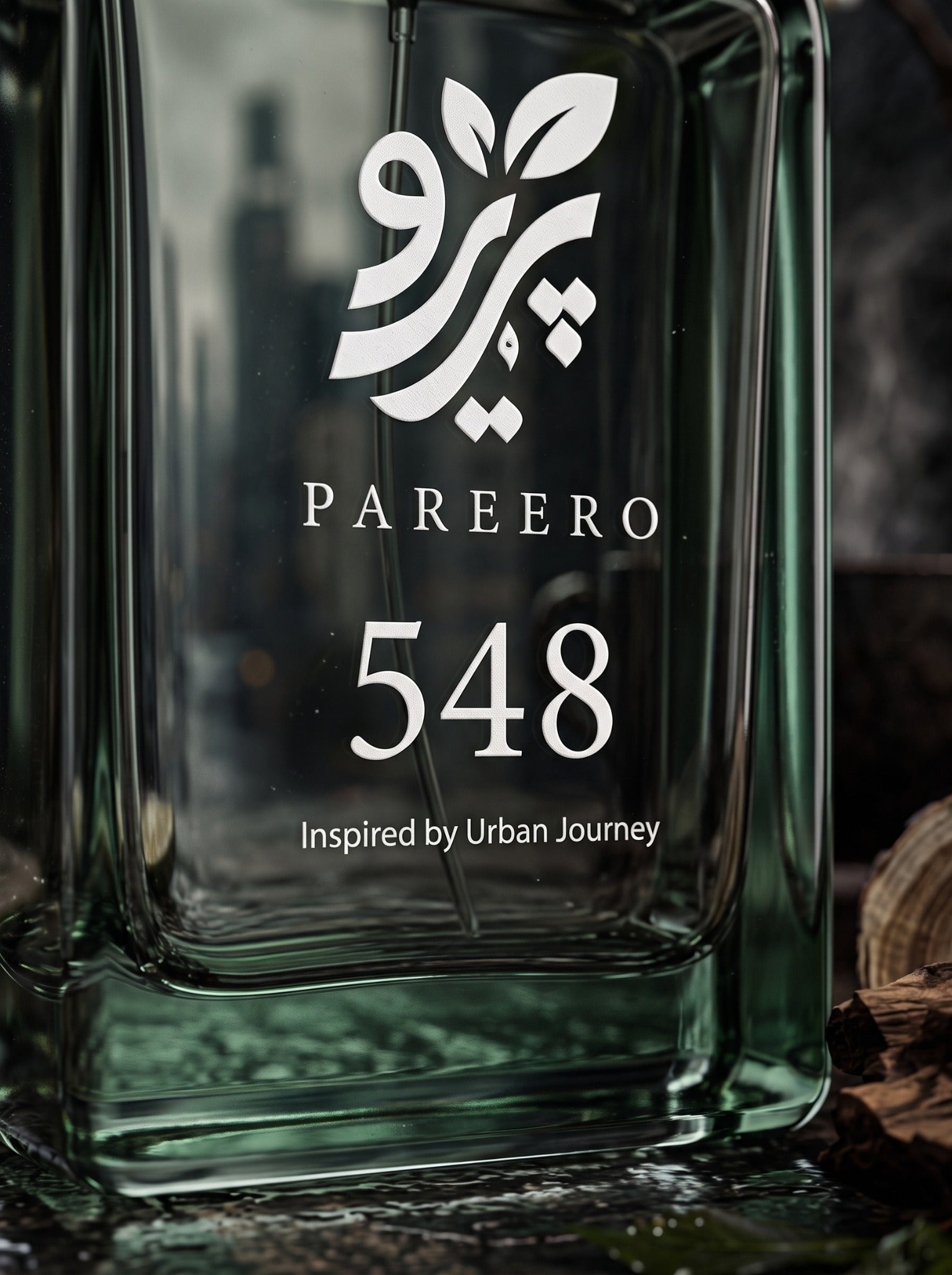 Macro glass and logo detail of the PAREERO 548 Urban Journey fragrance bottle